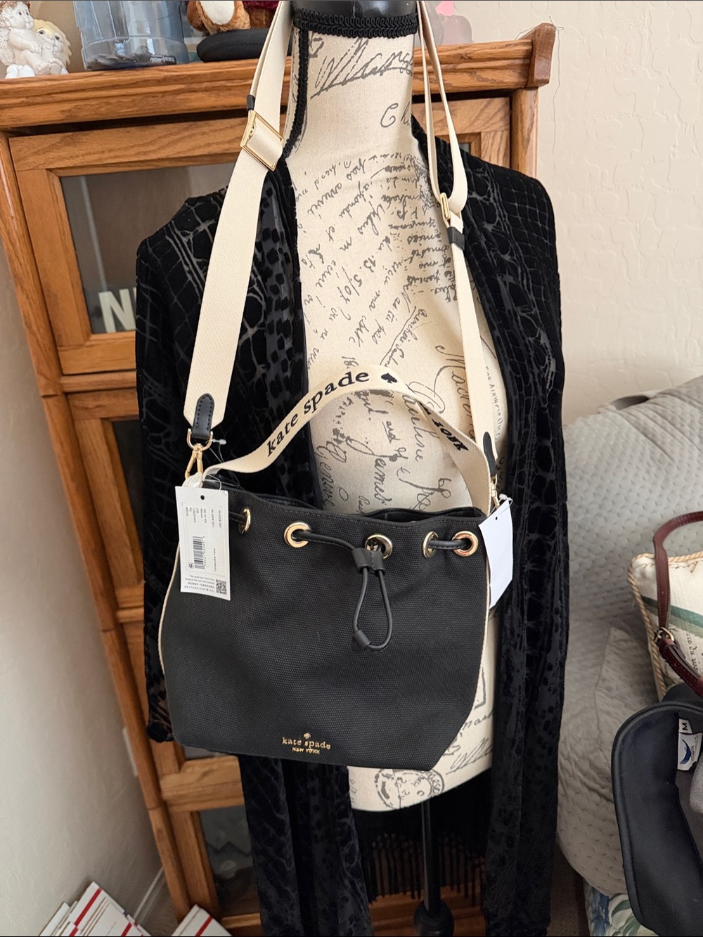 Kate Spade Black Canvas Drawstring Crossbody with Cream Strap